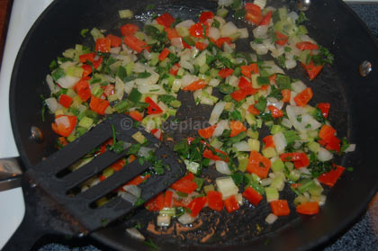 Peppers, Onion, Parsley Cooked Peppers, Onion, Parsley, Cooked. Ready to add Garlic and Chicken Stock.