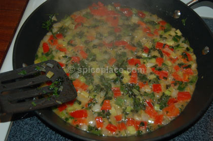 Reducing the Chicken Stock - Note the Rapid Boil