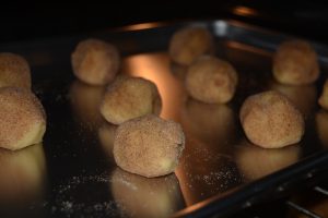 Snickerdoodle Cookie Balls just placed in oven